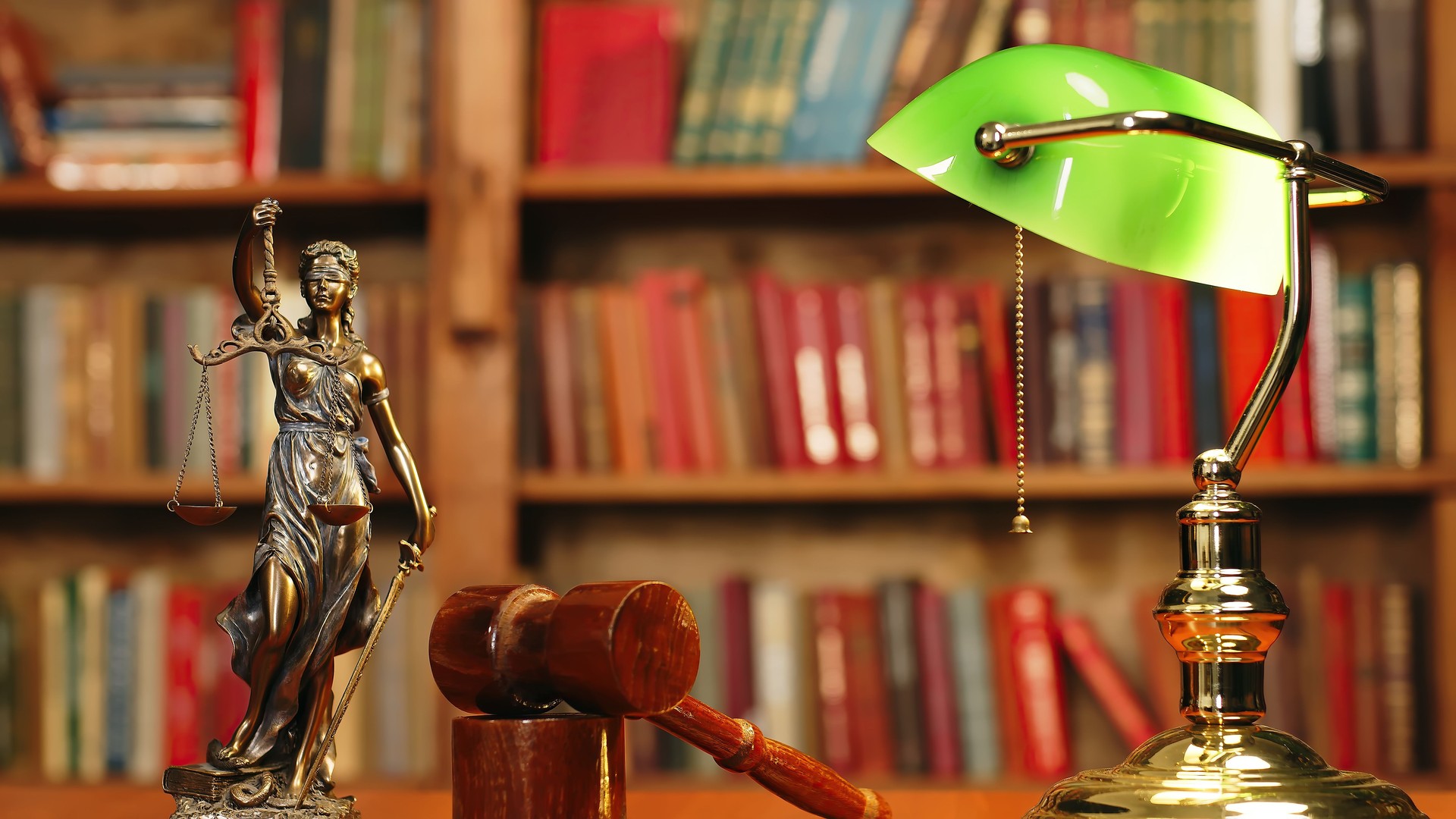 Close-up of a lawyer or judge's workplace with a fimida on the table. Concept of legal law, corruption and laws.