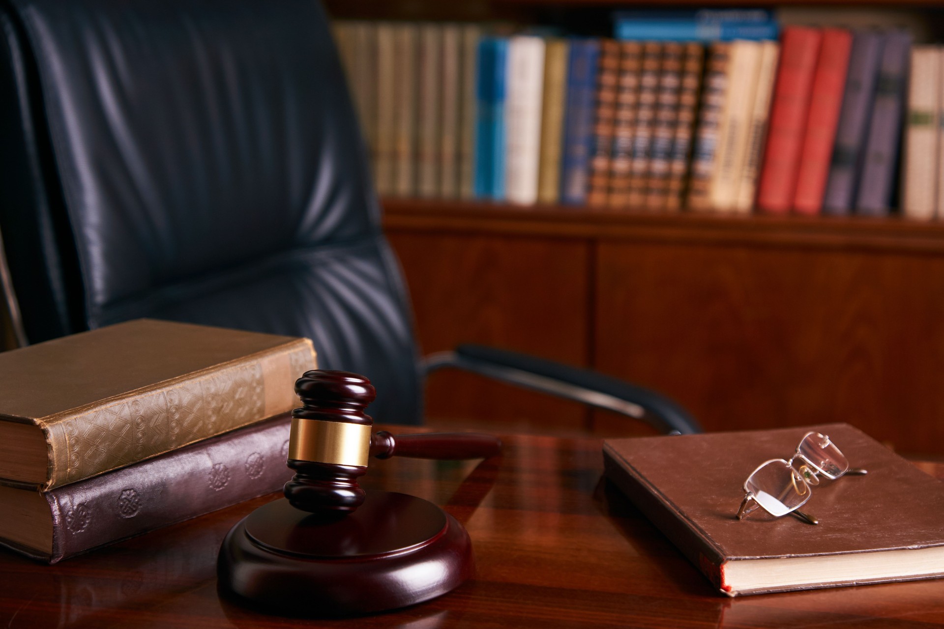 Judge's Gavel or mallet on wooden table