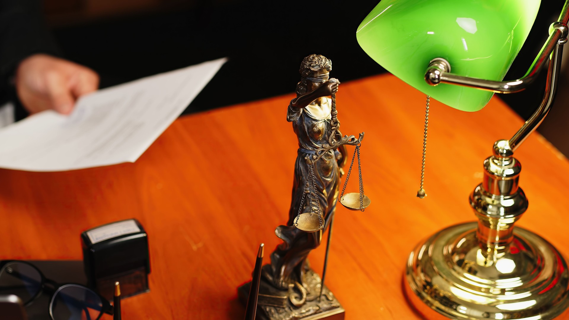 Justice and law concept. Judge or lawyer in a courtroom working in an office. Legal law, advice and justice concept.